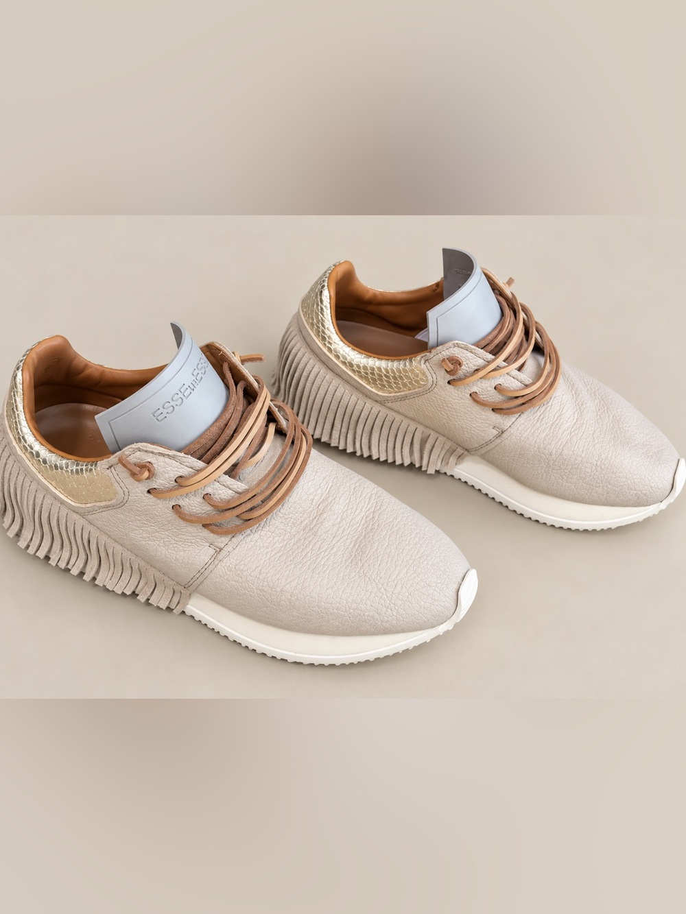 ESSEutESSE Cream Leather Fringe Sneakers with Metallic Gold Detail